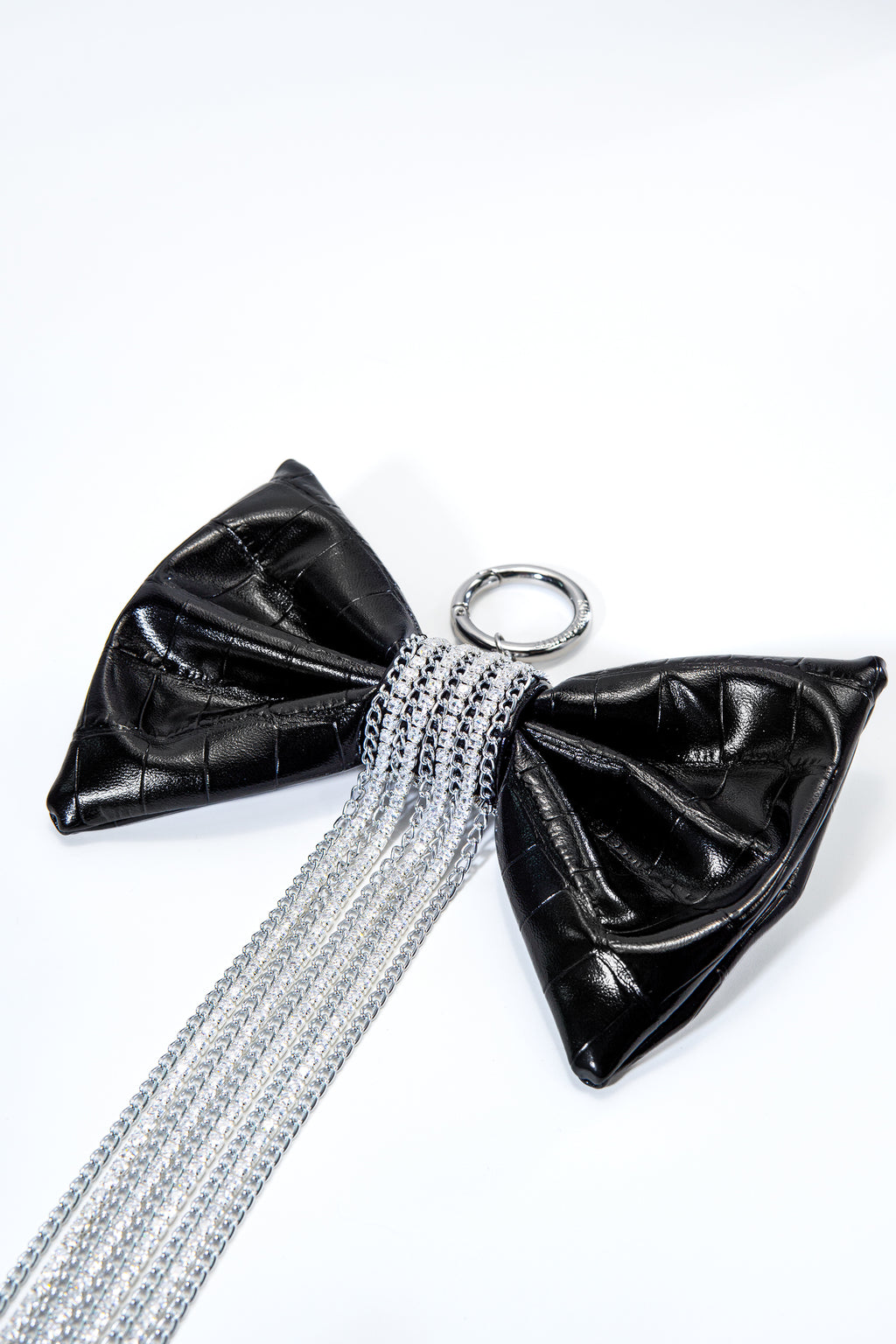 Crocodile-Embossed Bow With Cascading Fringe Chain Charm