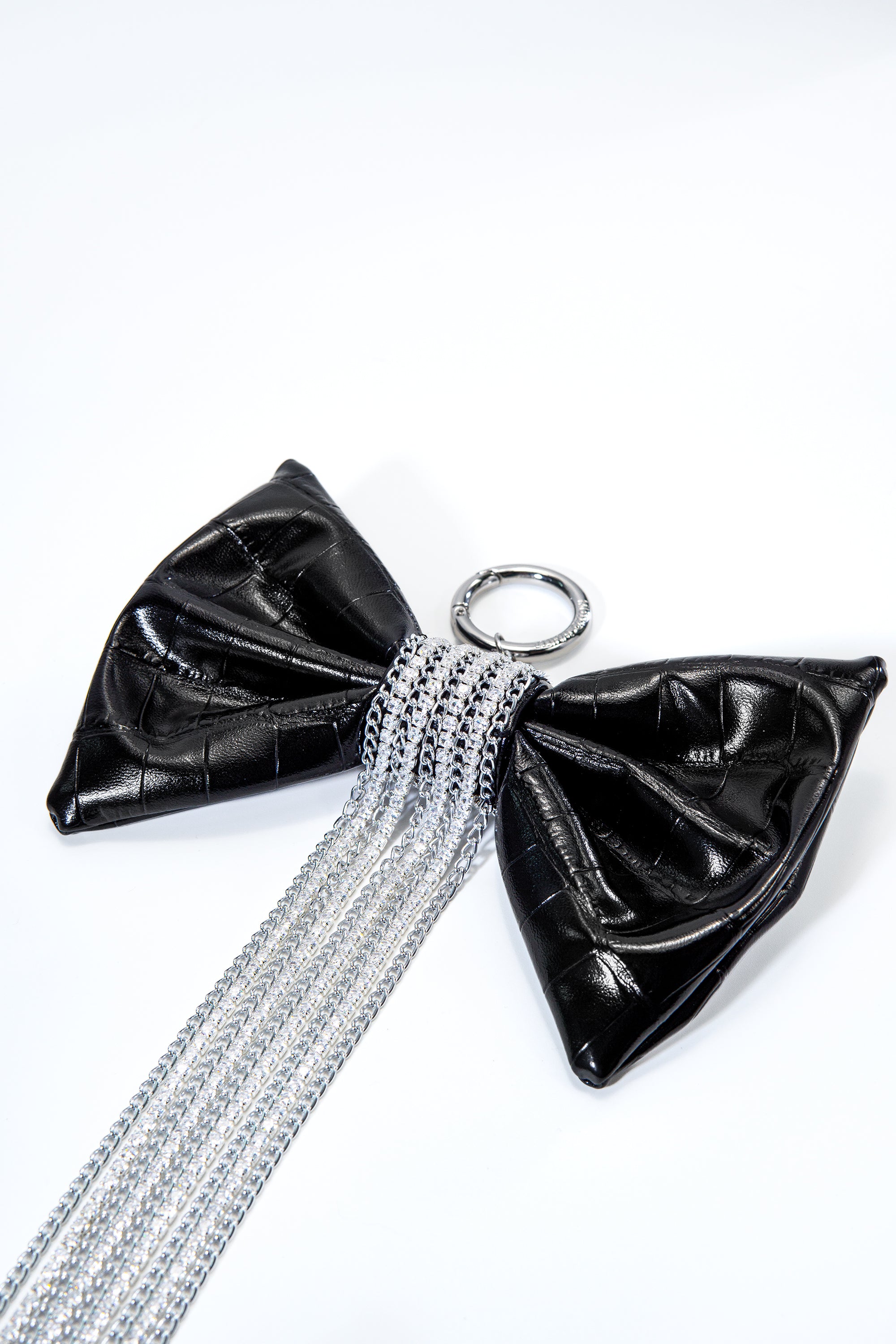 Crocodile-Embossed Bow With Cascading Fringe Chain Charm