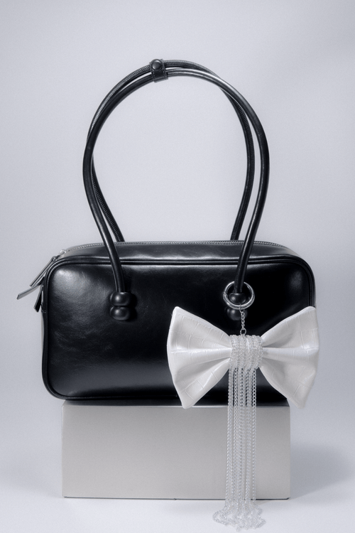 Crocodile-Embossed Bow With Cascading Fringe Chain Charm
