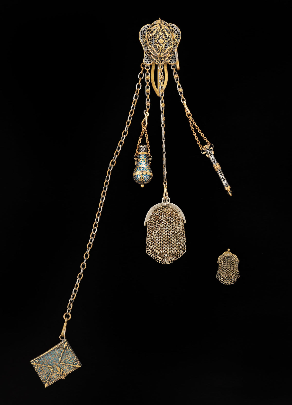 Late 19th-century French chatelaine with chains holding a mesh purse, a scent bottle and a small notebook